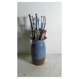 Pottery Vase with collection of Knitting Needles