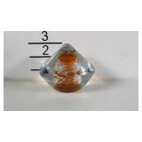 Clear and amber glass paperweight