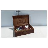 Wooden cigar box with Mardi Gras beads