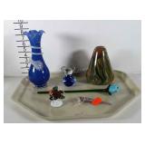 Glass vase, bear, fish, rose, seashell, and