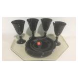 Black china- four wine glasses and four plates