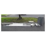 Group lot of PVC pipe and galvanized trashcan