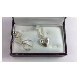 Silver earrings and pendant necklace set