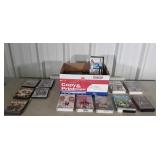 Box of VHS tapes and dvds