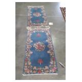 Two blue flower design hallway runners both are