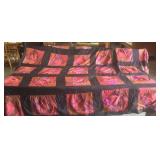 Silk quilt has a small tear in stitching 94x80