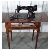 Singer Sewing machine in cabinet, not complete so