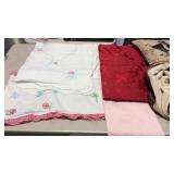 Two totes of material and linens