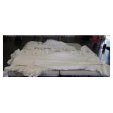 Country ruffled curtains and two pillows
