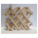 Wooden accordion style wine rack, holds 8 bottles