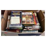 Box of DVDs and VHS tapes