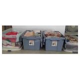 Three totes of linens and blankets, one tote of
