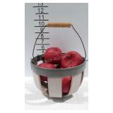 Ceramic basket of artificial apples