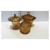 3 Amber glass covered candy dishes - 1 is carnival