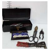 Poly toolbox with, studsensor, snips, rivet tool,