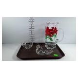 Beverage pitcher with hand painted floral design,