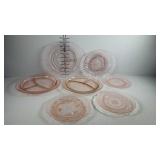 Pink depression - four 8" plates, and three 10"