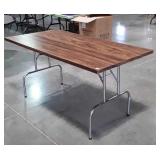 Table, heavy laminated board top on Folding legs,