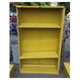 Yellow metal shelf five feet tall