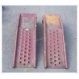 Two metal lawn mower ramps