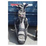 Bag with golf clubs