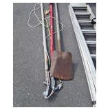Two limb saws and shovel