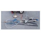 Group lot of fishing poles with net
