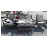 Four piece wicker patio set, does show use ware