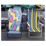 Group of four beach chairs and boogie board
