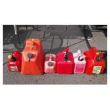Group of six poly fuel cans
