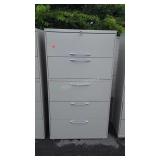 Five drawer metal filing cabinet 64" tall does