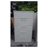 Five drawer metal filing cabinet 64" tall does