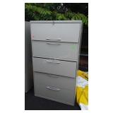 Five drawer metal filing cabinet 64" tall does