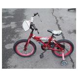 Kids lightning Mc queen bike does show use wear on