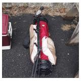 Quest golf bag with golf clubs