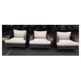 Three all weather wicker swivel chairs, cushions