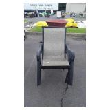 Group of four patio chairs