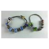 Two charm bracelets