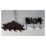 Cast wall hooks, WELCOME and Bath House prices