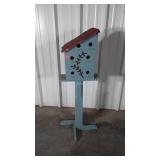 Bird House, 6 port hole house fixed on free
