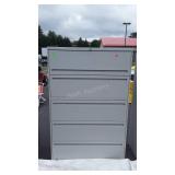 Five drawer metal filing cabinet 64" tall, does