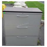 Three drawer metal filing cabinet 41" tall, NO KEY