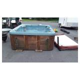Four person hot tub with cover