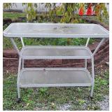 Glass top patio bar four feet long and 37" tall