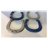 Four Horse shoes