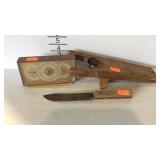 Boot jack, knife, and a stomoguide