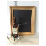 Lighter wine decor bottle and a framed chalkboard