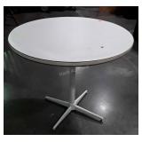 Table, 35" round laminated top table with wear.