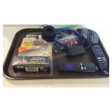 Roku device plus headphones, and a rabbit tv