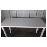 Table, metal legs with heavy made laminated top,